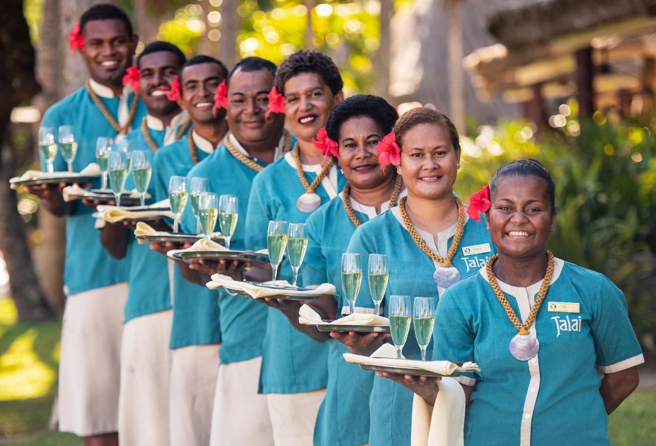 Outrigger Fiji Beach Resort Korotogo Dış mekan fotoğraf Staff at the resort