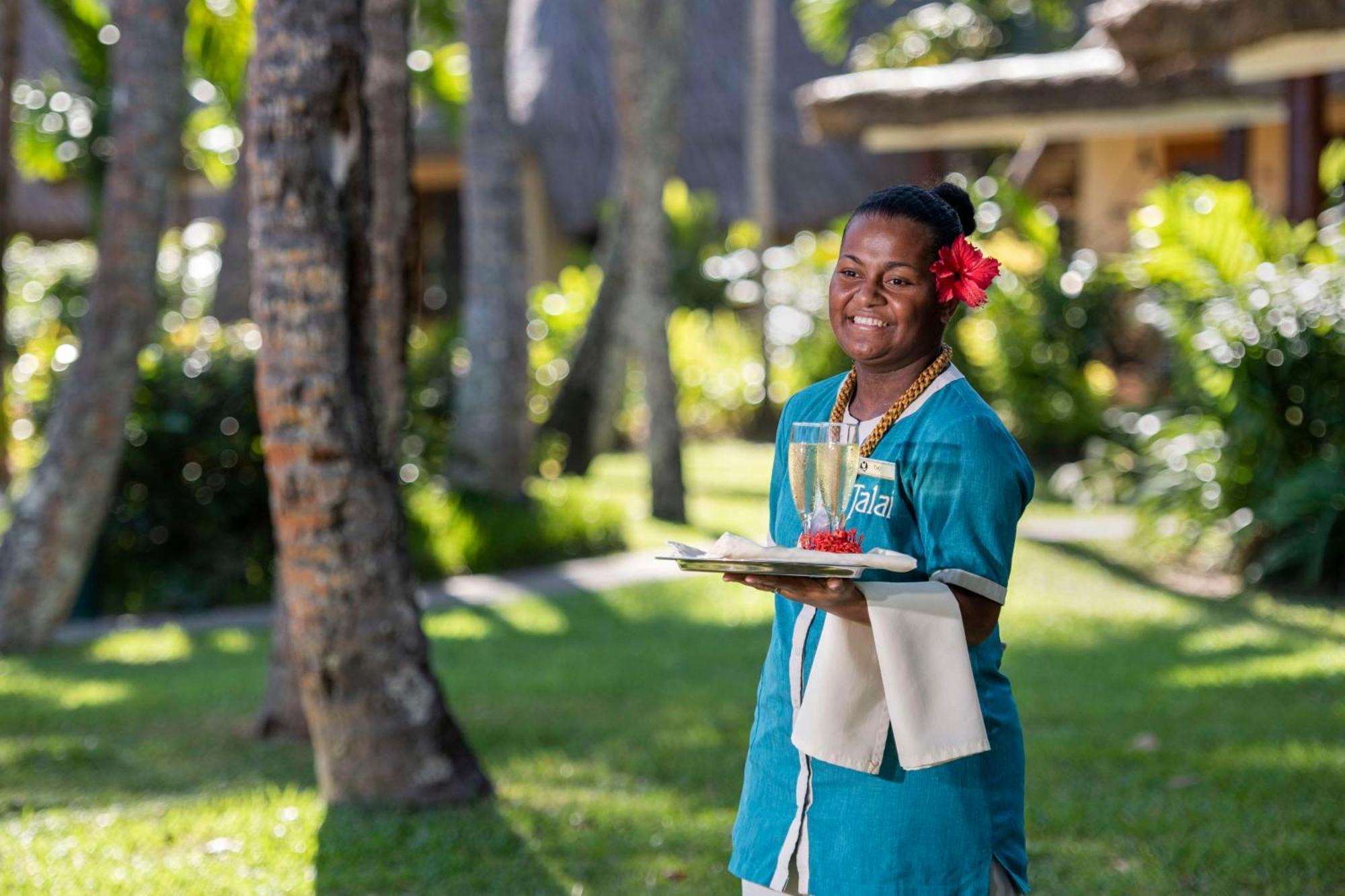 Outrigger Fiji Beach Resort Korotogo Dış mekan fotoğraf A hotel staff in Mauritius