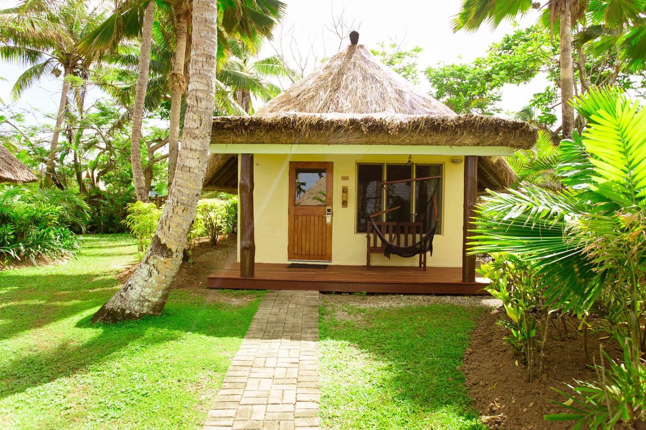 Outrigger Fiji Beach Resort Korotogo Dış mekan fotoğraf A bungalow at the resort